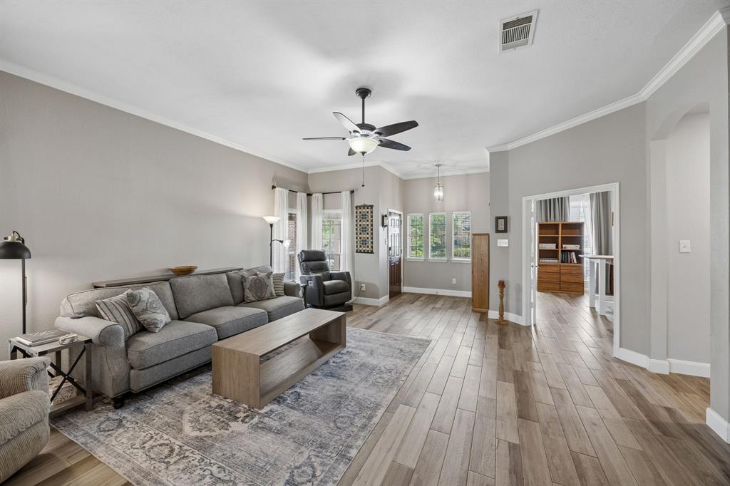 4133 Drexmore Road Fort Worth, TX 76244 - Photo 10 of 31 a living room with furniture and wooden floor