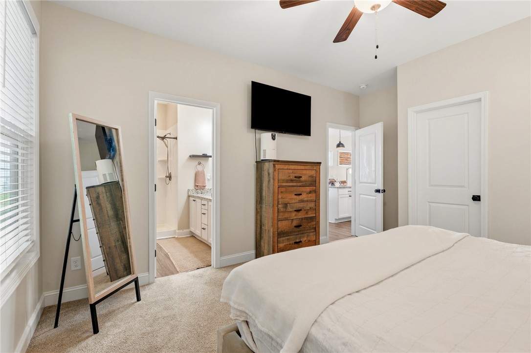 47 A Main Street Pelzer, SC 29669 - Photo 17 of 27 This cozy bedroom retreat offers comfort and style, creating a peaceful sanctuary for relaxation.