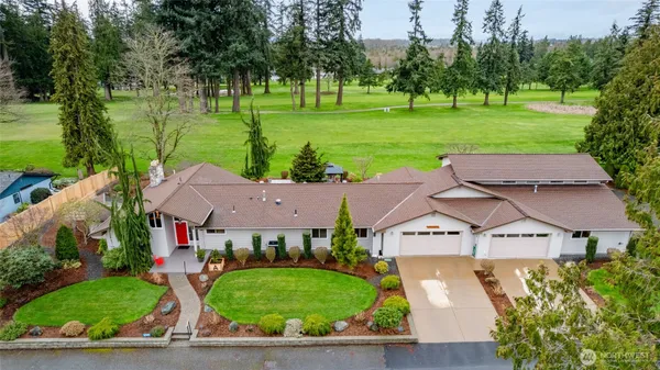 a aerial view of a house with garden