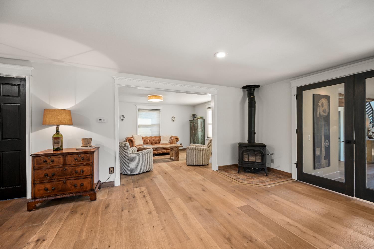 9463 Stoops Road Dillsboro, IN 47018 - Photo 17 of 99 Opposite the Dining Room, a cozy Living Room nestles in an adjacent space with windows facing the back yard & pool.