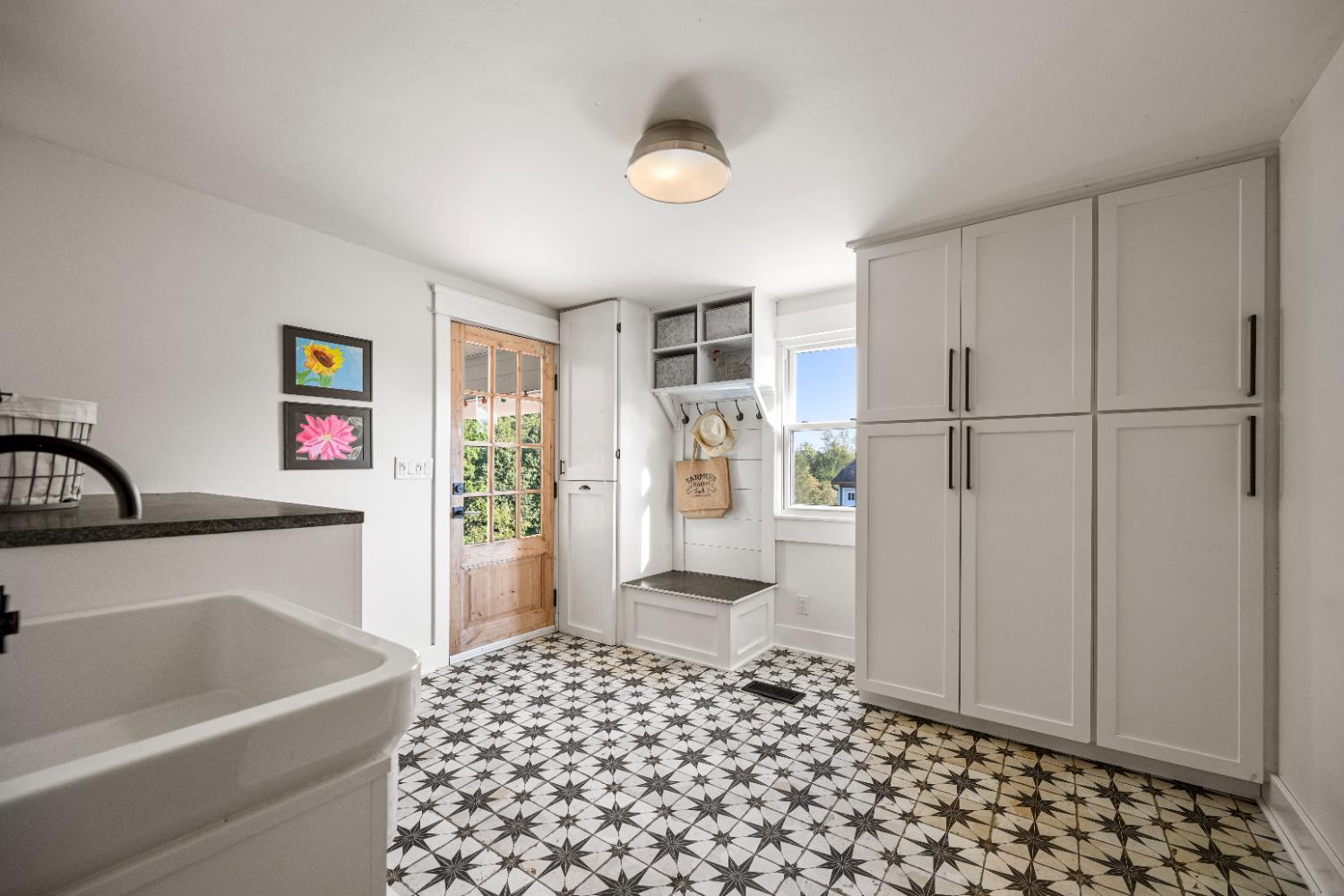 9463 Stoops Road Dillsboro, IN 47018 - Photo 29 of 99 Full height storage cabinets plus a convenient seating bench near the door complete the mudroom.