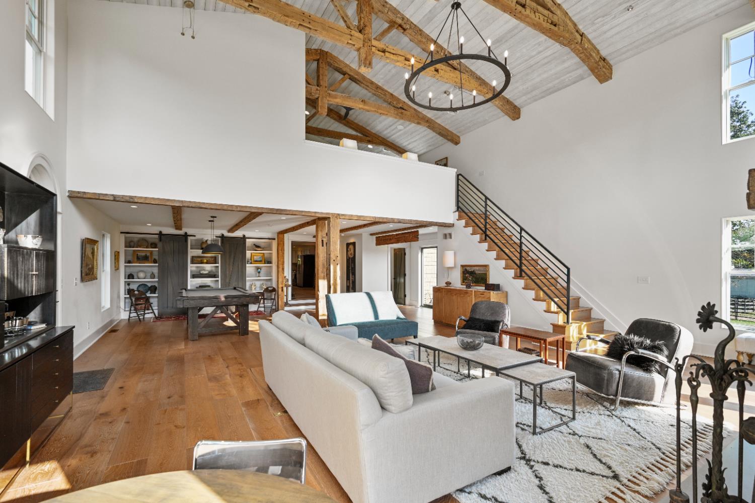 9463 Stoops Road Dillsboro, IN 47018 - Photo 37 of 99 View of the Great Room showing the staircase to the Master Suite loft.