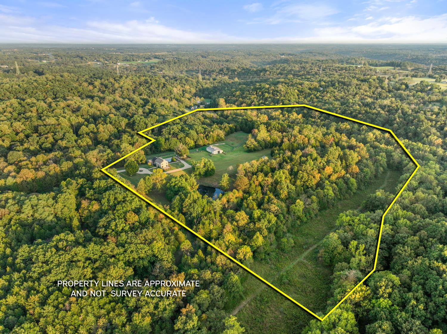 9463 Stoops Road Dillsboro, IN 47018 - Photo 5 of 99 Open fields near the house & outbuildings plus a lower pasture blend with woods, pond & creeks...all isolated at the end of the road. Welcome to your own private oasis!