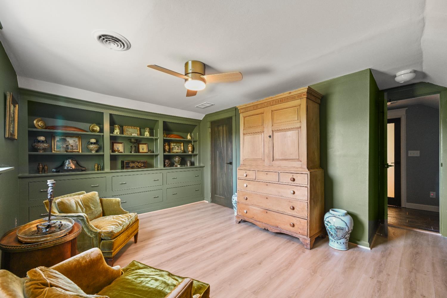 9463 Stoops Road Dillsboro, IN 47018 - Photo 51 of 99 Bedroom 3 features new LVT wood look plank flooring, plus a wall of built-in cabinets & shelving.