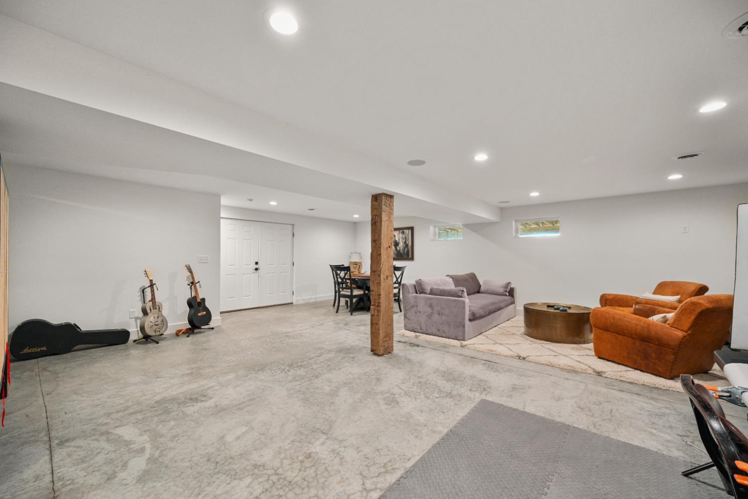 9463 Stoops Road Dillsboro, IN 47018 - Photo 55 of 99 Another view of the Family Room. the double doors on the far side open into an exterior staircase well that provides access to the rear yard.