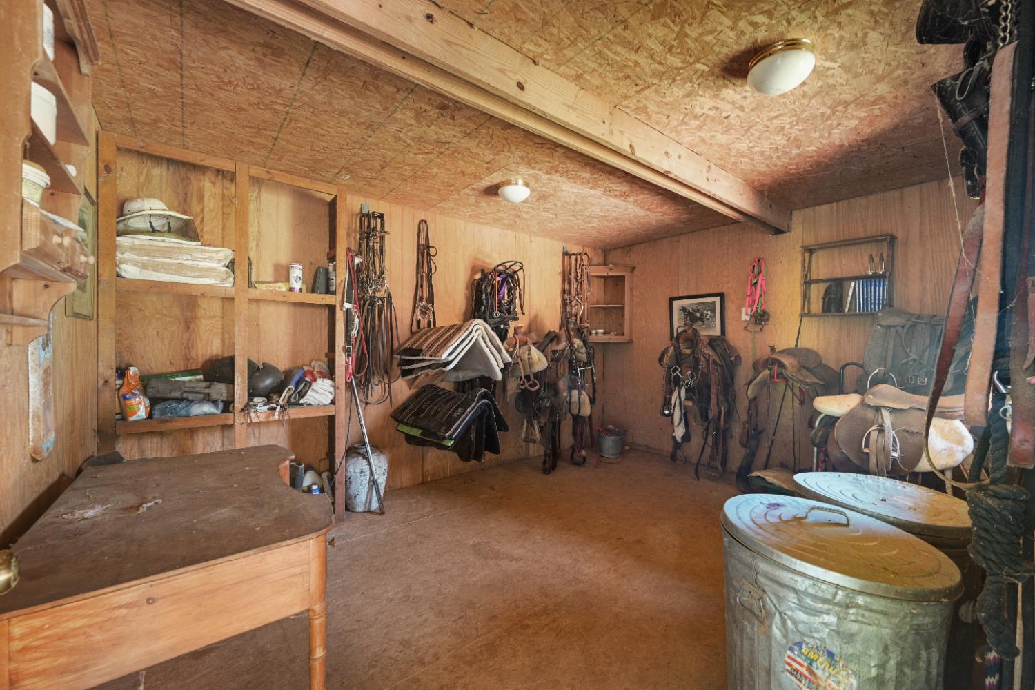 9463 Stoops Road Dillsboro, IN 47018 - Photo 61 of 99 An enclosed tack room holds saddles, harnesses & other riding supplies.
