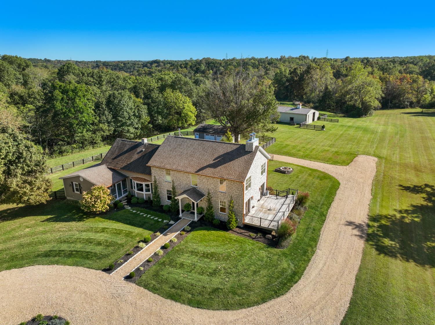 9463 Stoops Road Dillsboro, IN 47018 - Photo 76 of 99 Aerial of house, lawns, horse barn & pastures