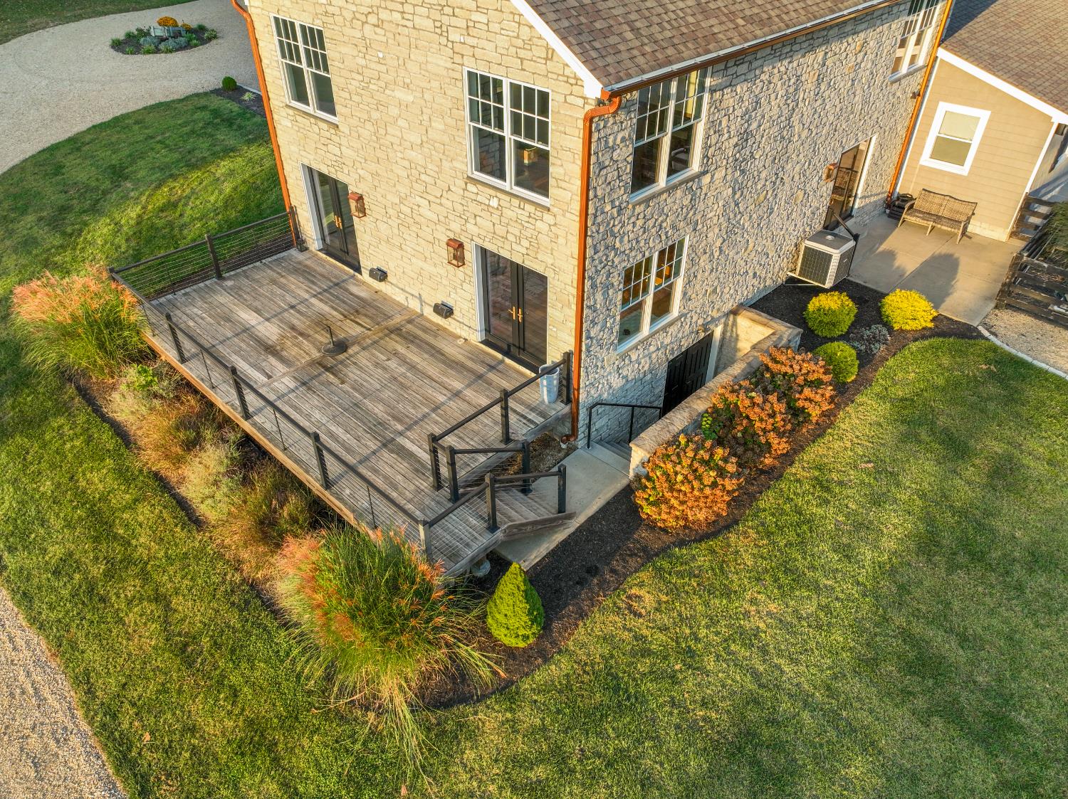 9463 Stoops Road Dillsboro, IN 47018 - Photo 78 of 99 Steps from the deck as well as the basement provide access to the yard,
