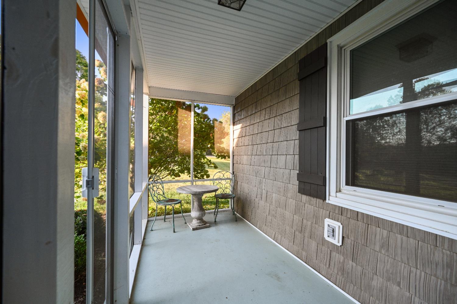 9463 Stoops Road Dillsboro, IN 47018 - Photo 89 of 99 The screen porch off the Butler's Pantry makes a quiet place to sit and relax in the shade