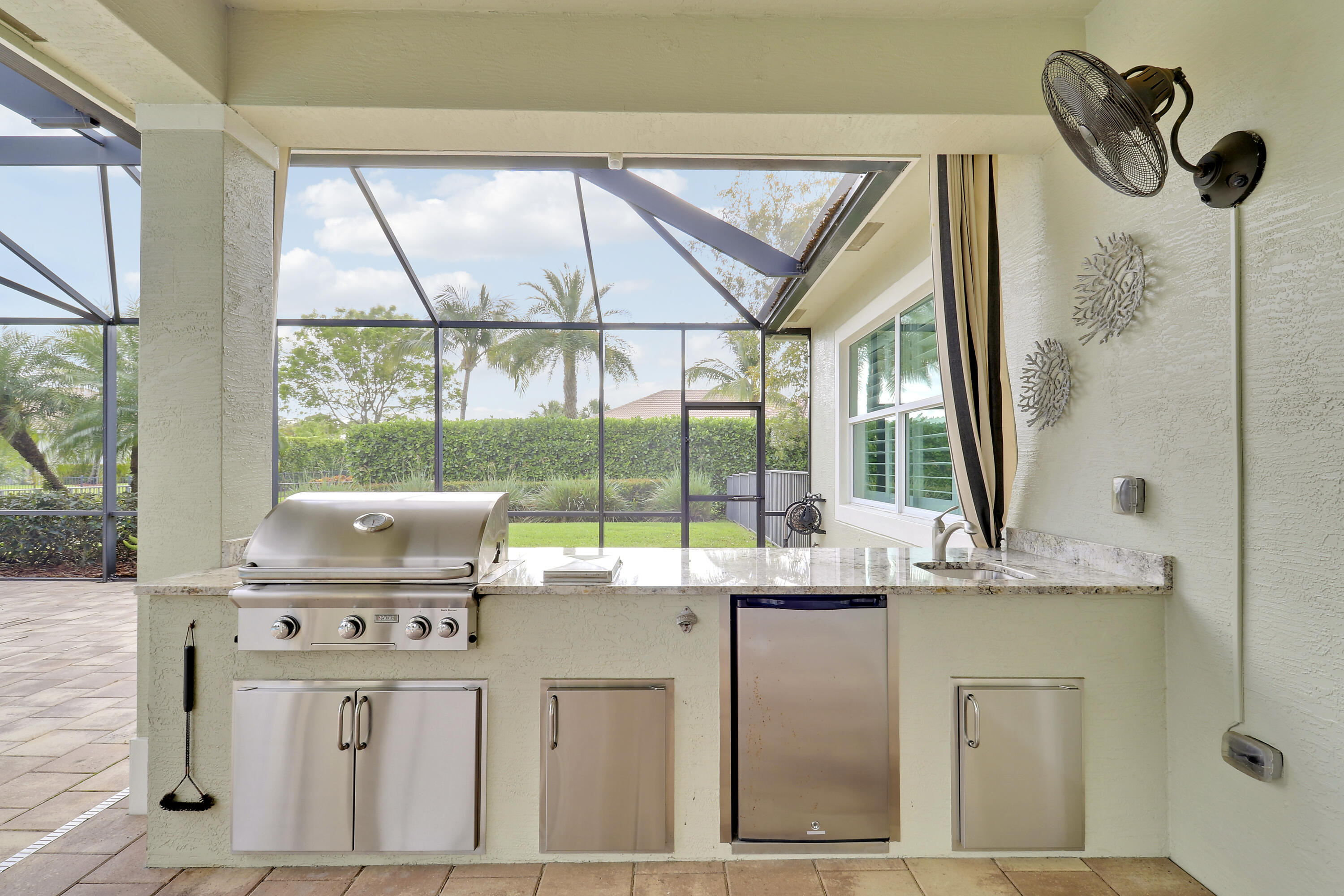 6798 Southeast Pierre Circle Stuart, FL 34997 - Photo 6 of 62 summer kitchen