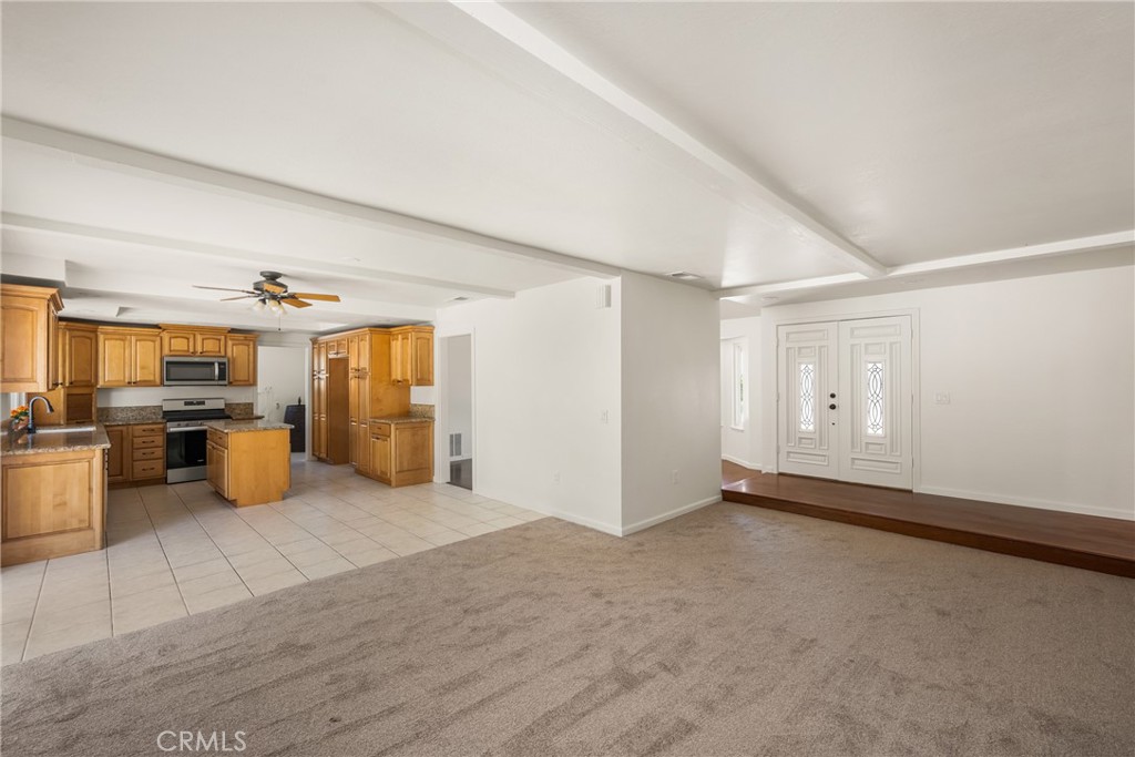 16481 Valle Vista Way Riverside, CA 92506 - Photo 12 of 73 a view of a livingroom with a flat screen tv