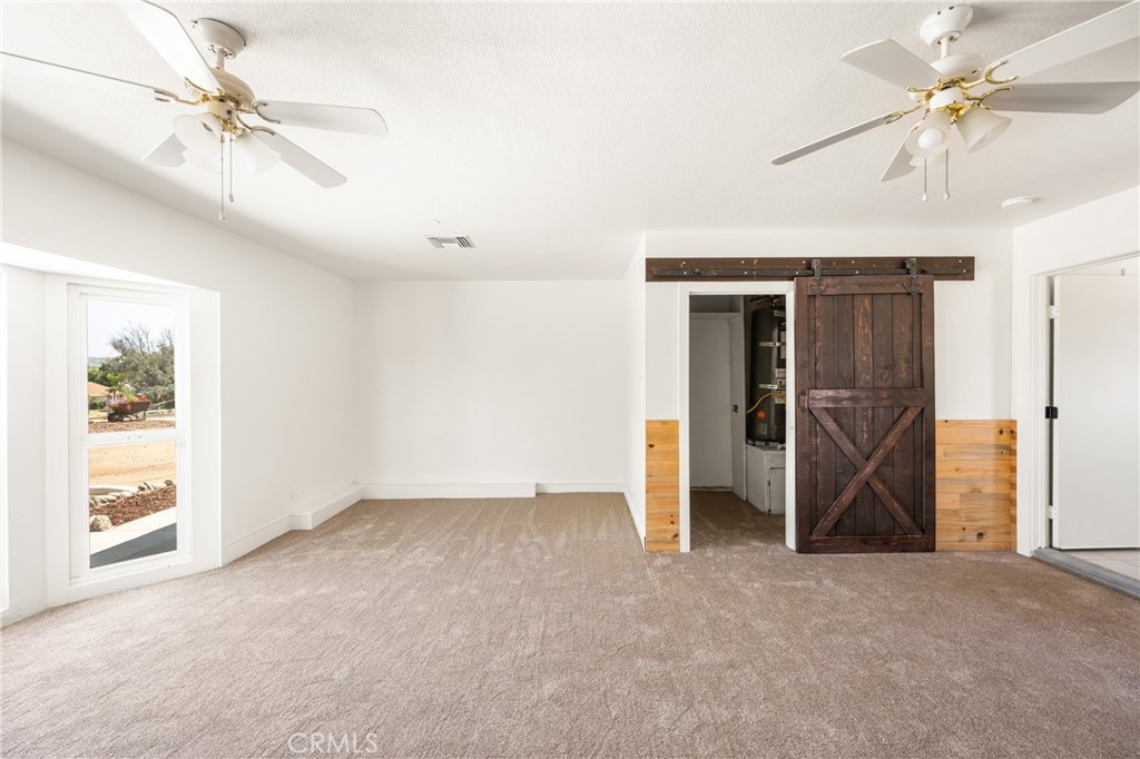 16481 Valle Vista Way Riverside, CA 92506 - Photo 40 of 73 a view of empty room with ceiling fan