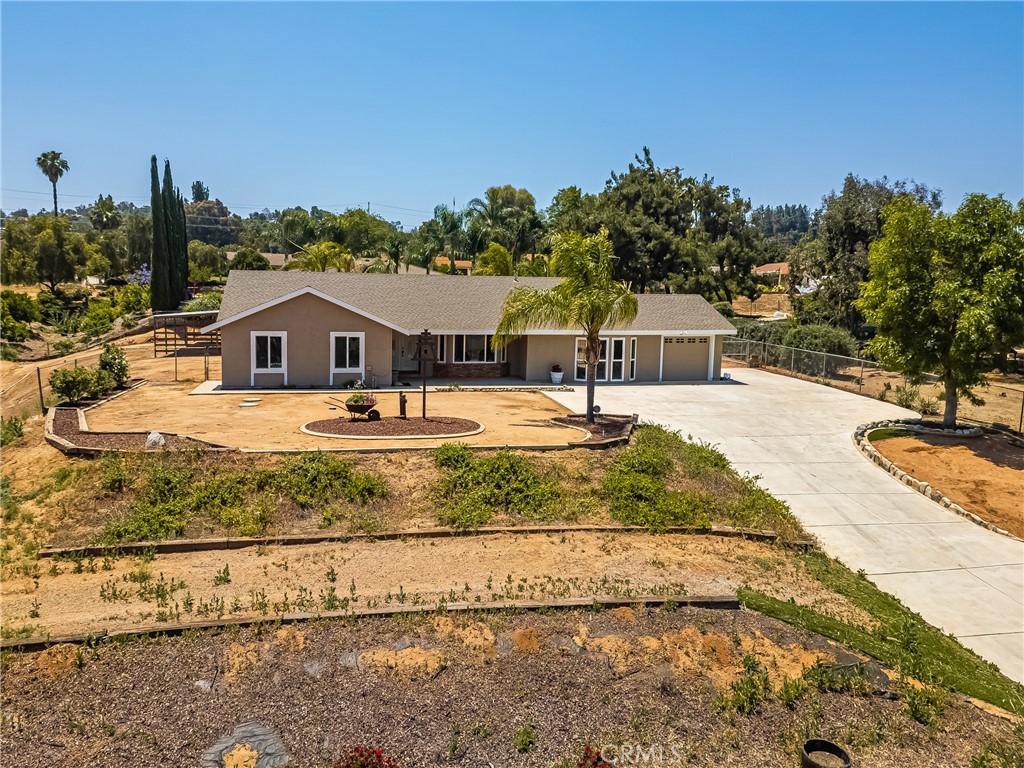 16481 Valle Vista Way Riverside, CA 92506 - Photo 5 of 73 a view of a house with a yard