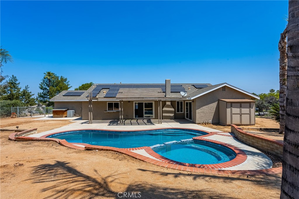 16481 Valle Vista Way Riverside, CA 92506 - Photo 6 of 73 a view of a house with pool and chairs