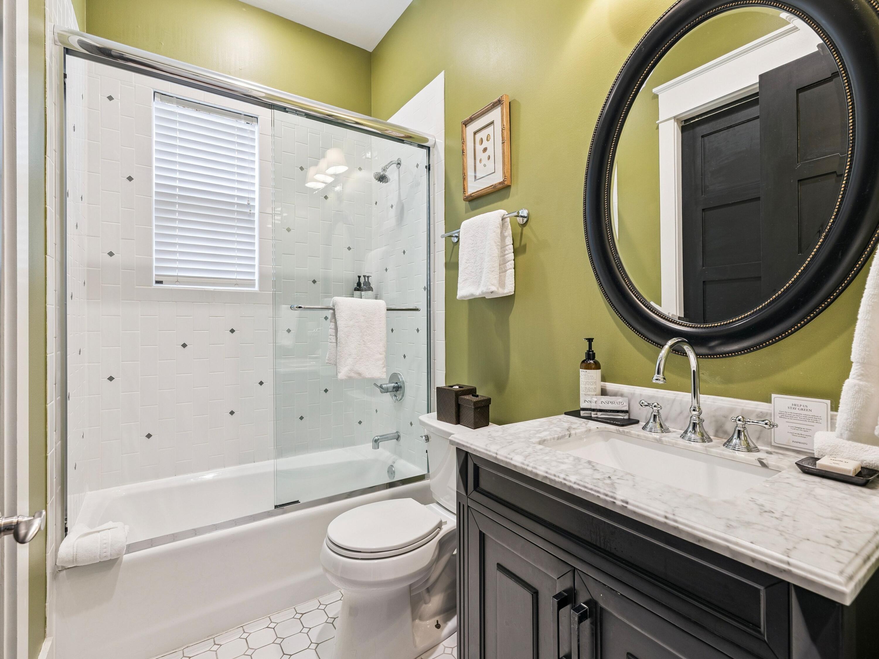 51 Mystic Cobalt Street Santa Rosa Beach, FL 32459 - Photo 13 of 46 a bathroom with a granite countertop toilet sink and mirror