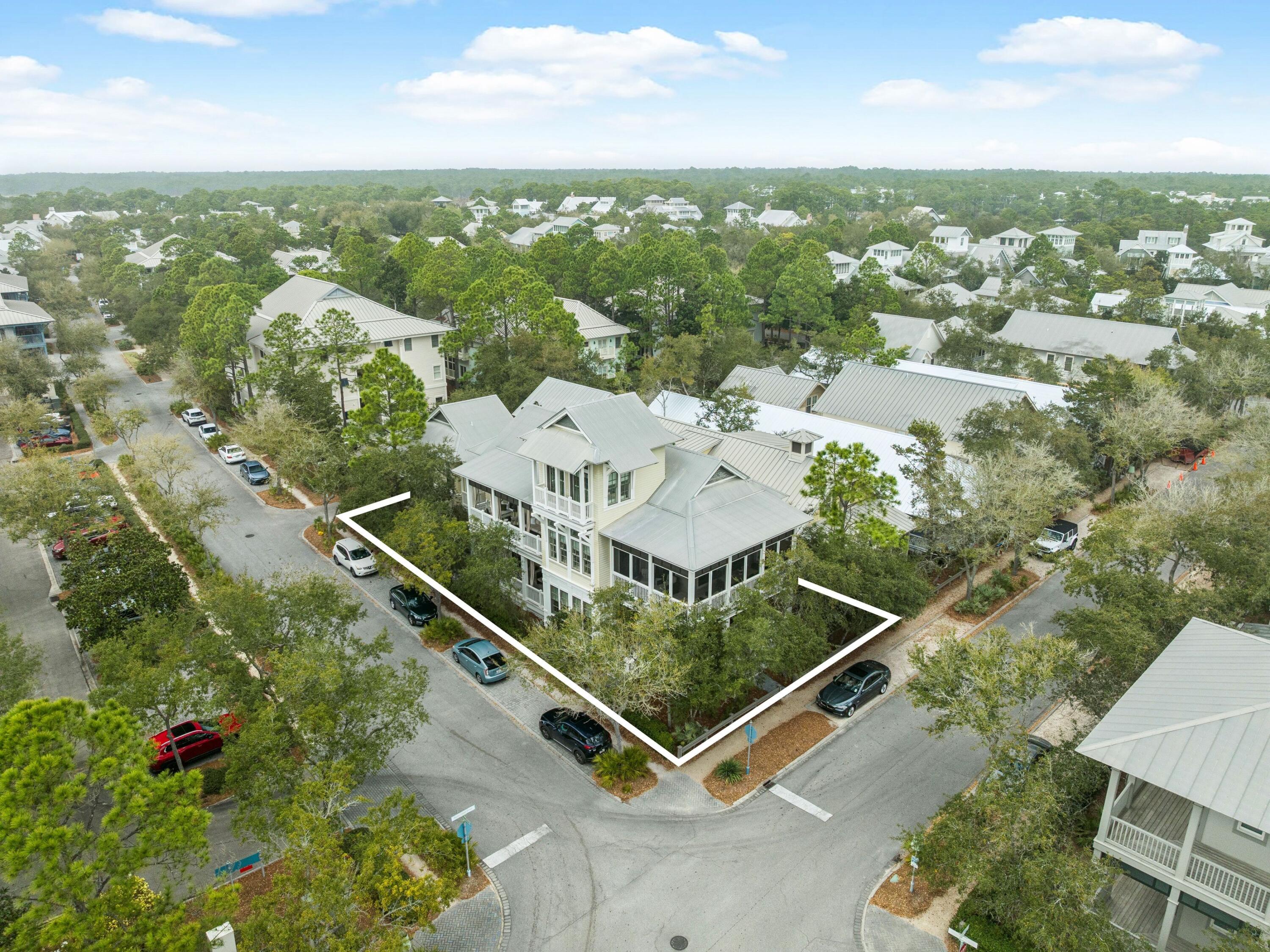 51 Mystic Cobalt Street Santa Rosa Beach, FL 32459 - Photo 40 of 46 an aerial view of residential houses with outdoor space and trees