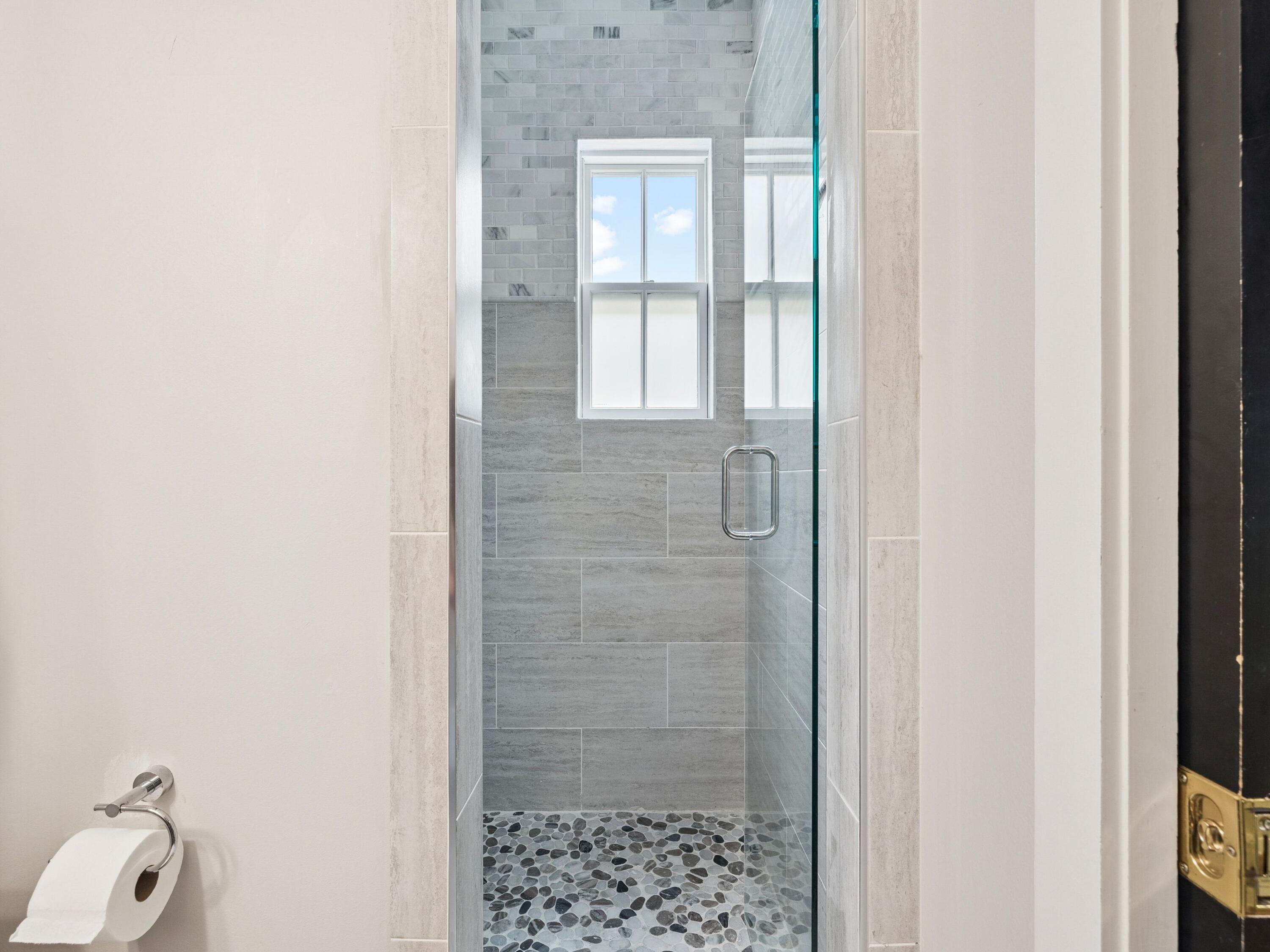51 Mystic Cobalt Street Santa Rosa Beach, FL 32459 - Photo 10 of 46 a bathroom with a shower