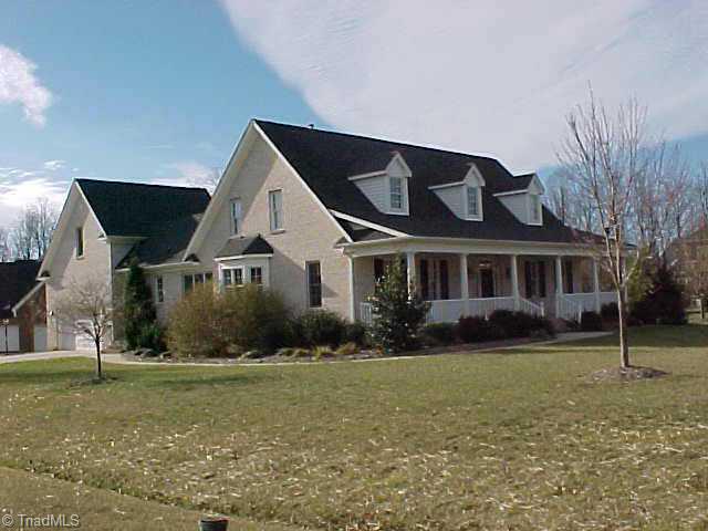 1589 Deer Run Court Oak Ridge, NC 27310 - Photo 1 of 9 Exterior Front.