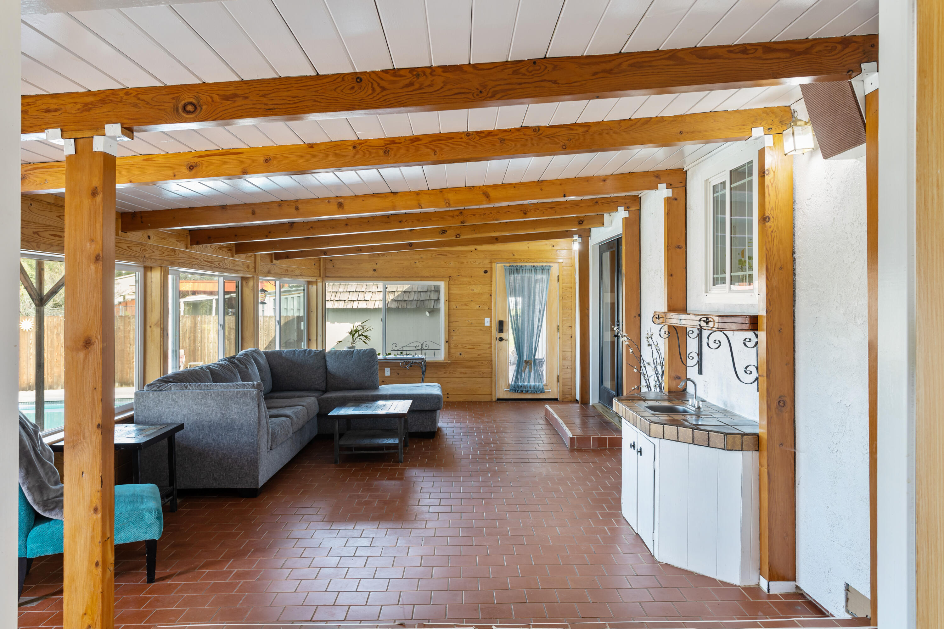 8641 Redbank Road Redding, CA 96001 - Photo 19 of 59 a living room with furniture and a large window