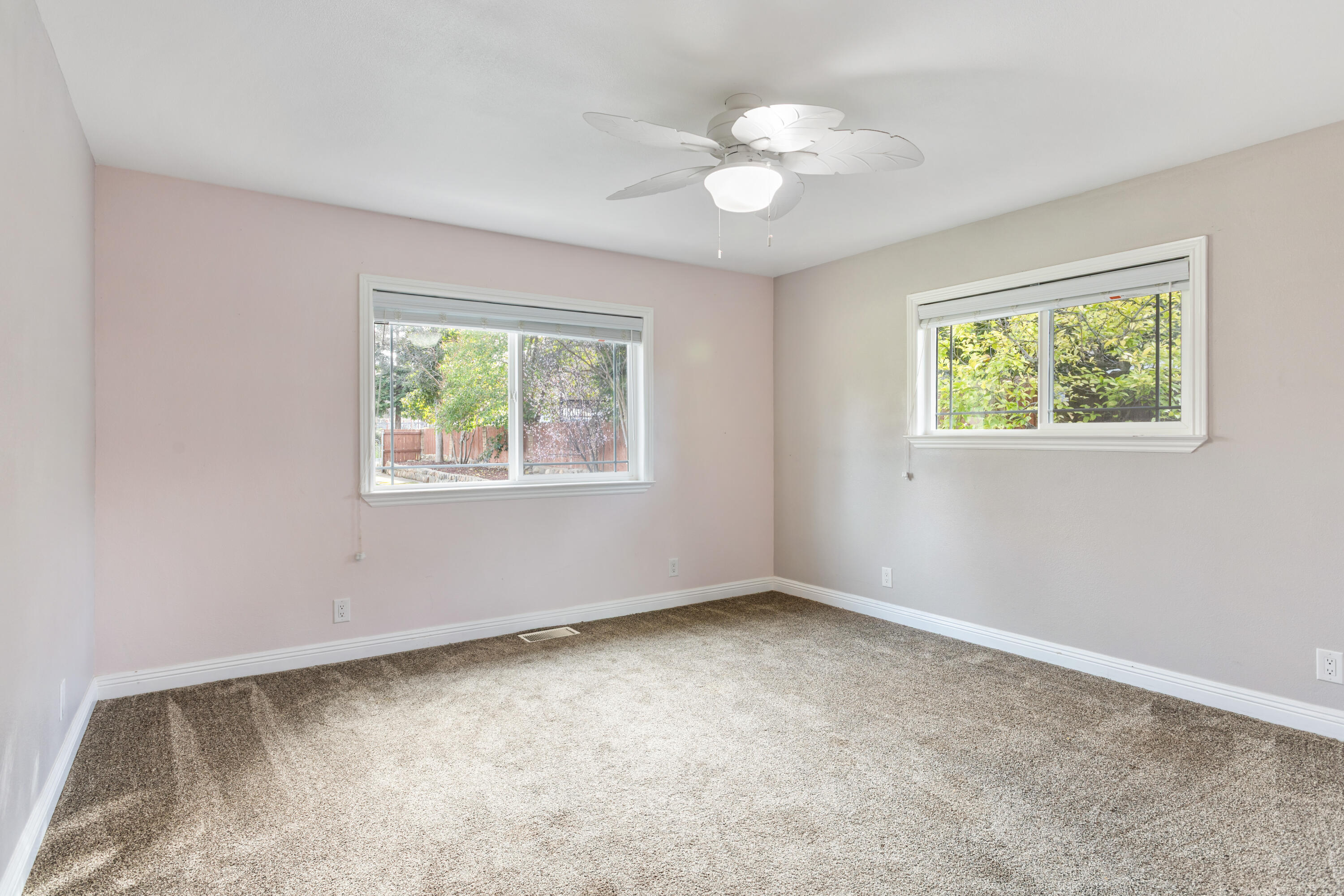 8641 Redbank Road Redding, CA 96001 - Photo 28 of 59 a view of room with window and ceiling fan