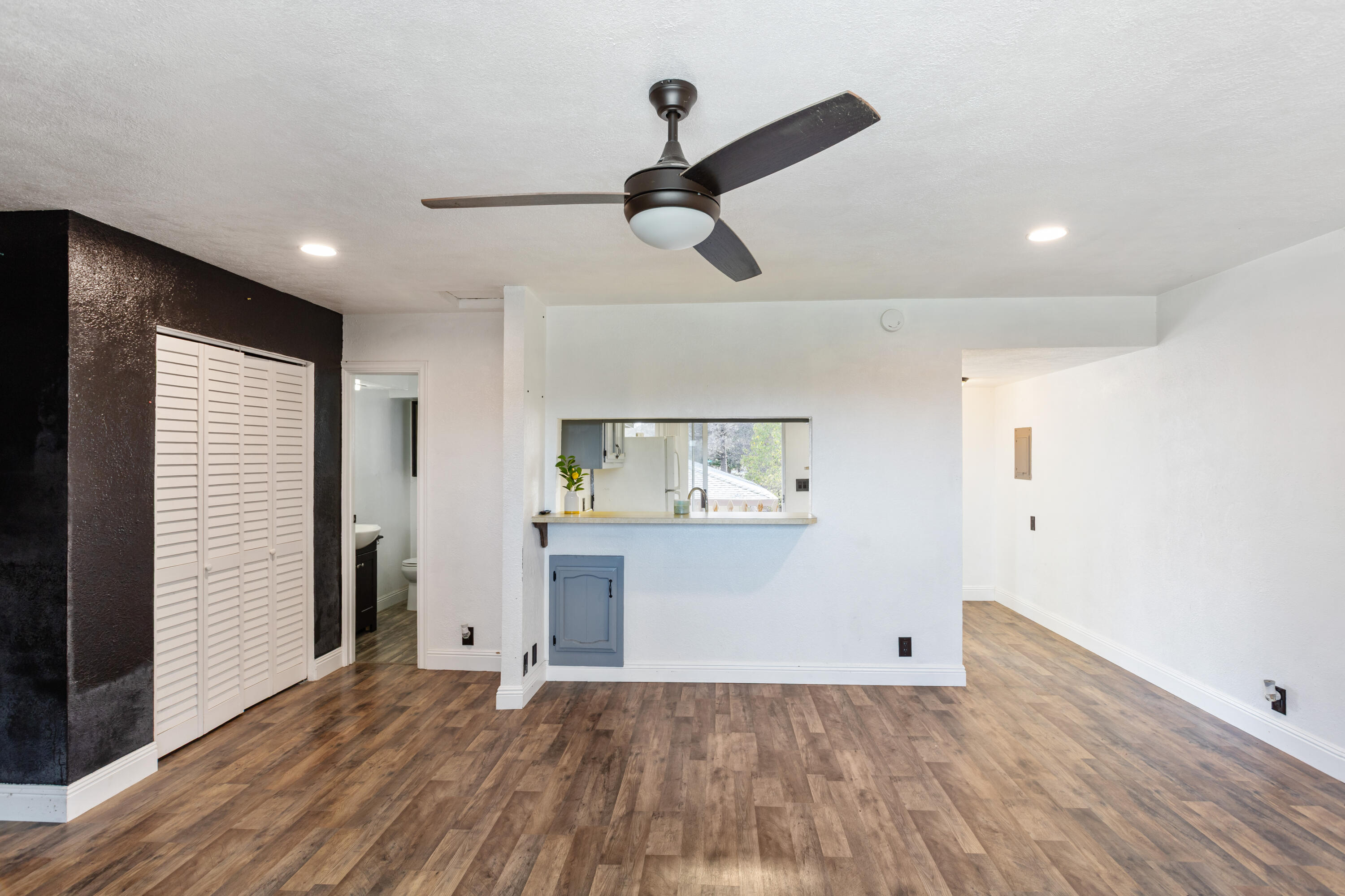 8641 Redbank Road Redding, CA 96001 - Photo 48 of 59 a view of empty room with wooden floor