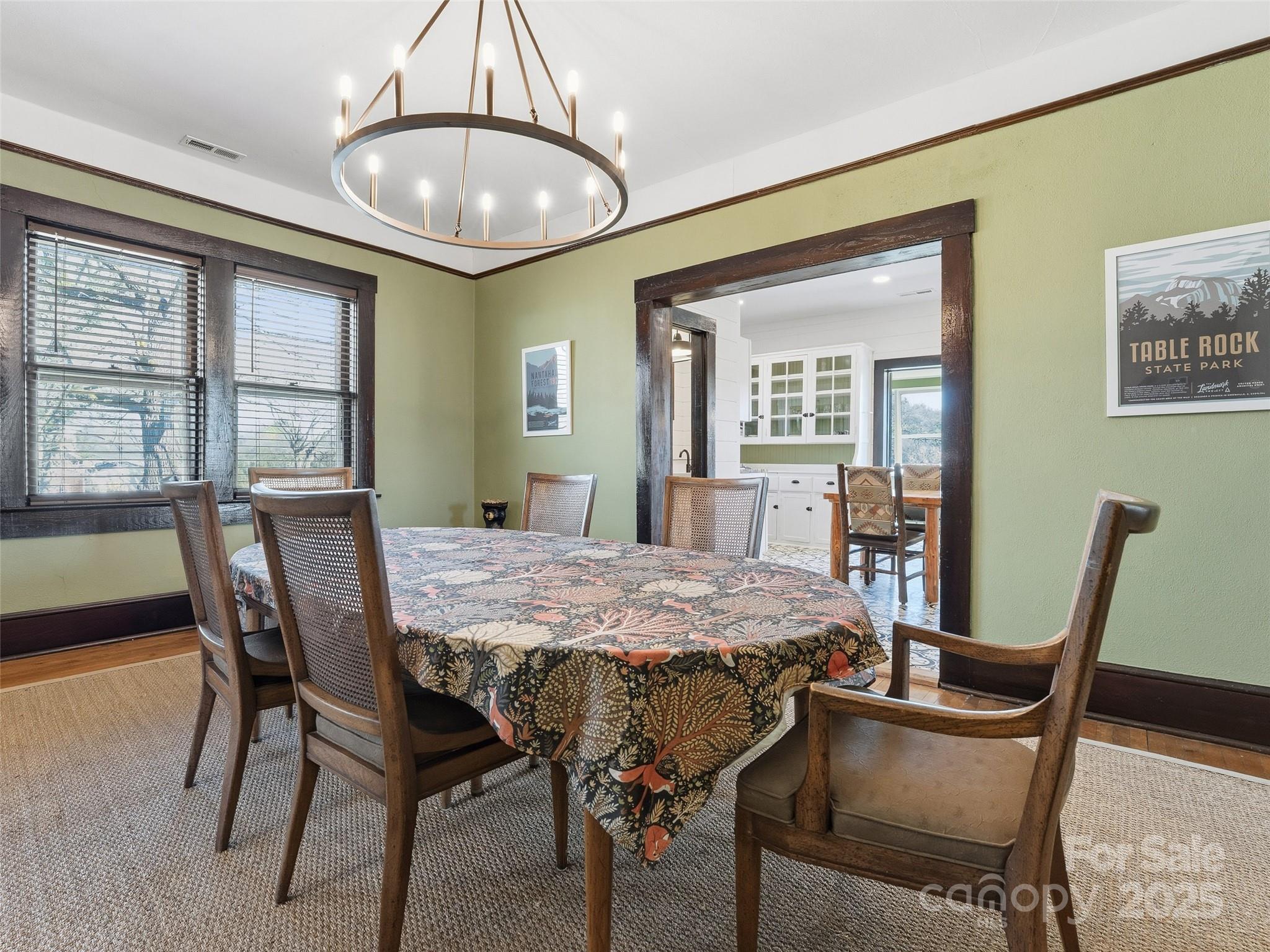 12 Sal's Lane Brevard, NC 28712 - Photo 15 of 39 a dining room with furniture a chandelier and wooden floor