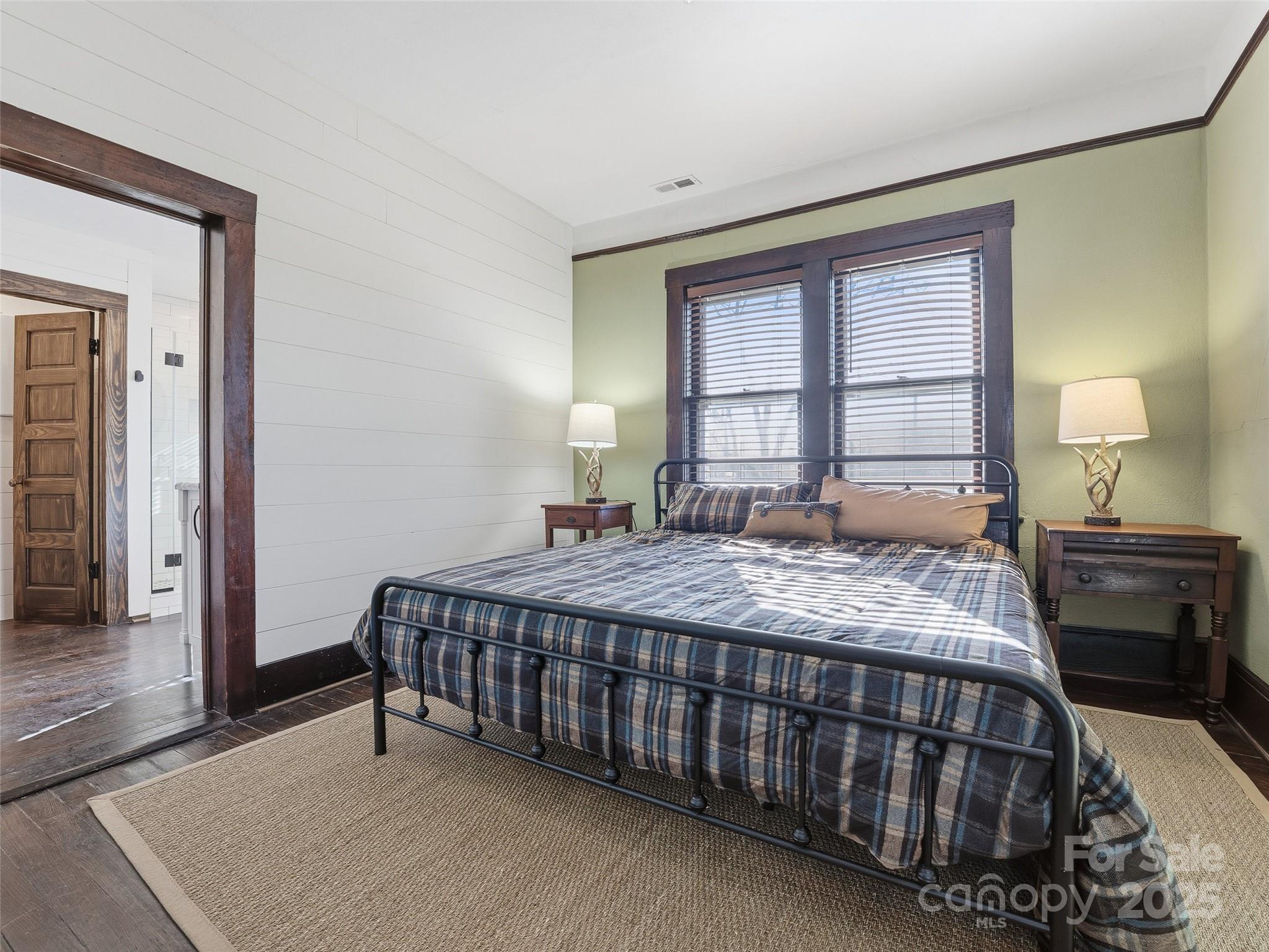12 Sal's Lane Brevard, NC 28712 - Photo 16 of 39 a bedroom with a bed table and a window