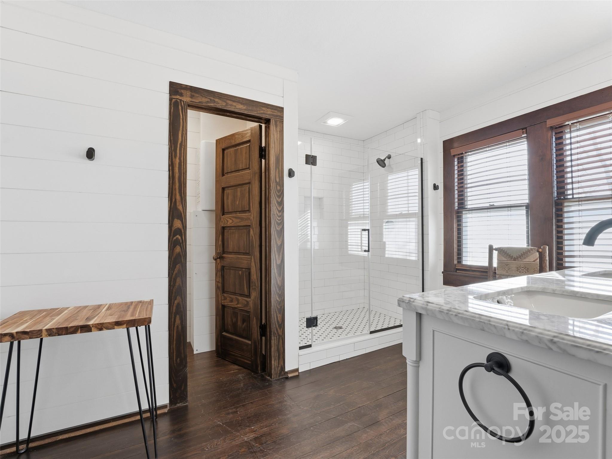 12 Sal's Lane Brevard, NC 28712 - Photo 19 of 39 a view of front door with hallway and wooden floor