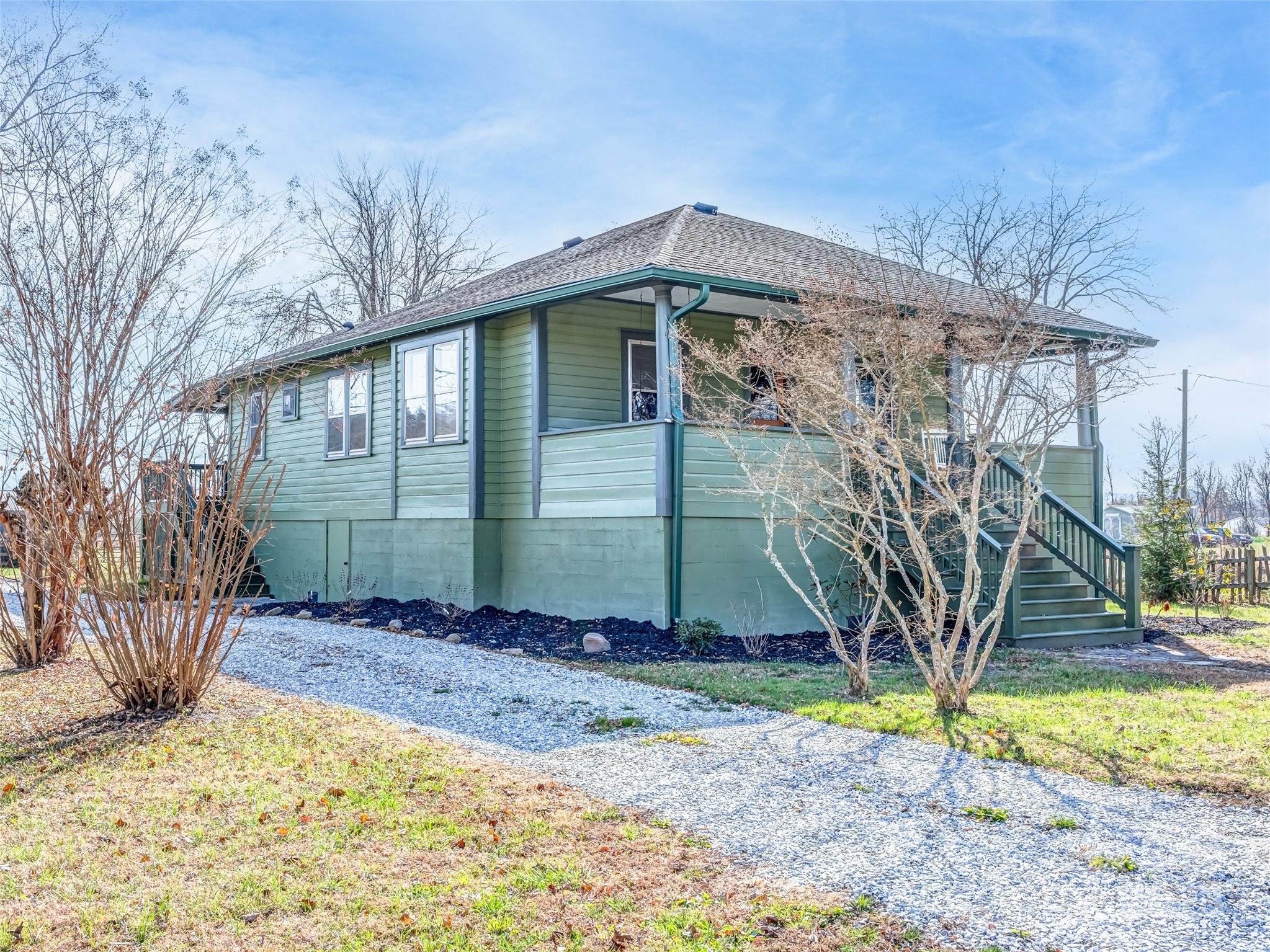 12 Sal's Lane Brevard, NC 28712 - Photo 2 of 39 a front view of a house with garden