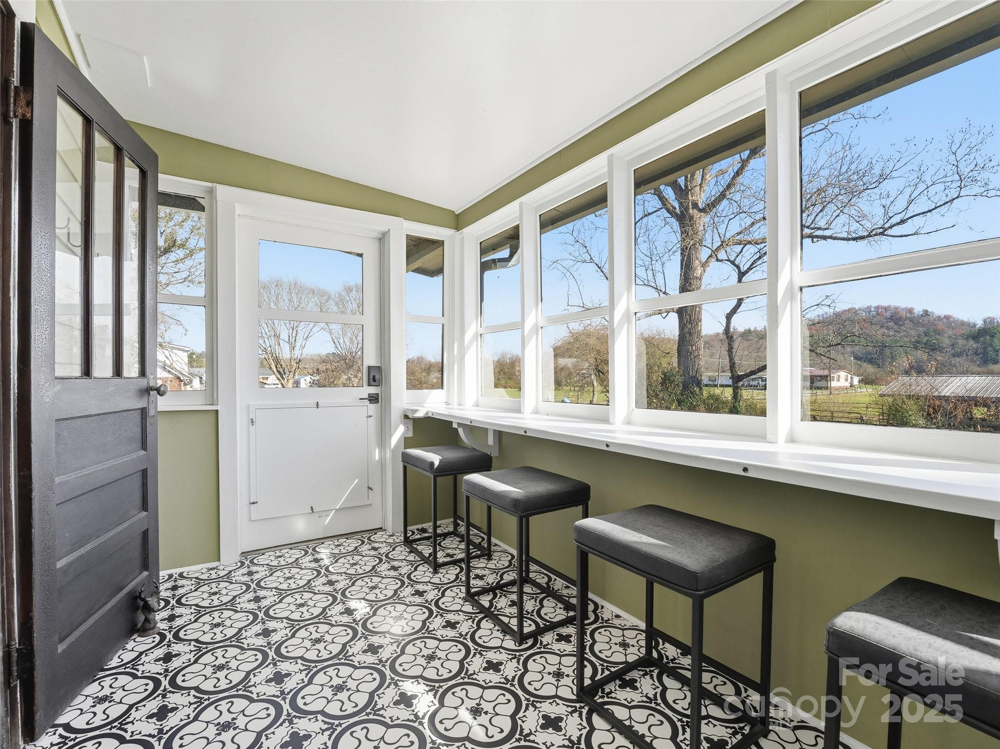 12 Sal's Lane Brevard, NC 28712 - Photo 34 of 39 a living room with a large window and furniture