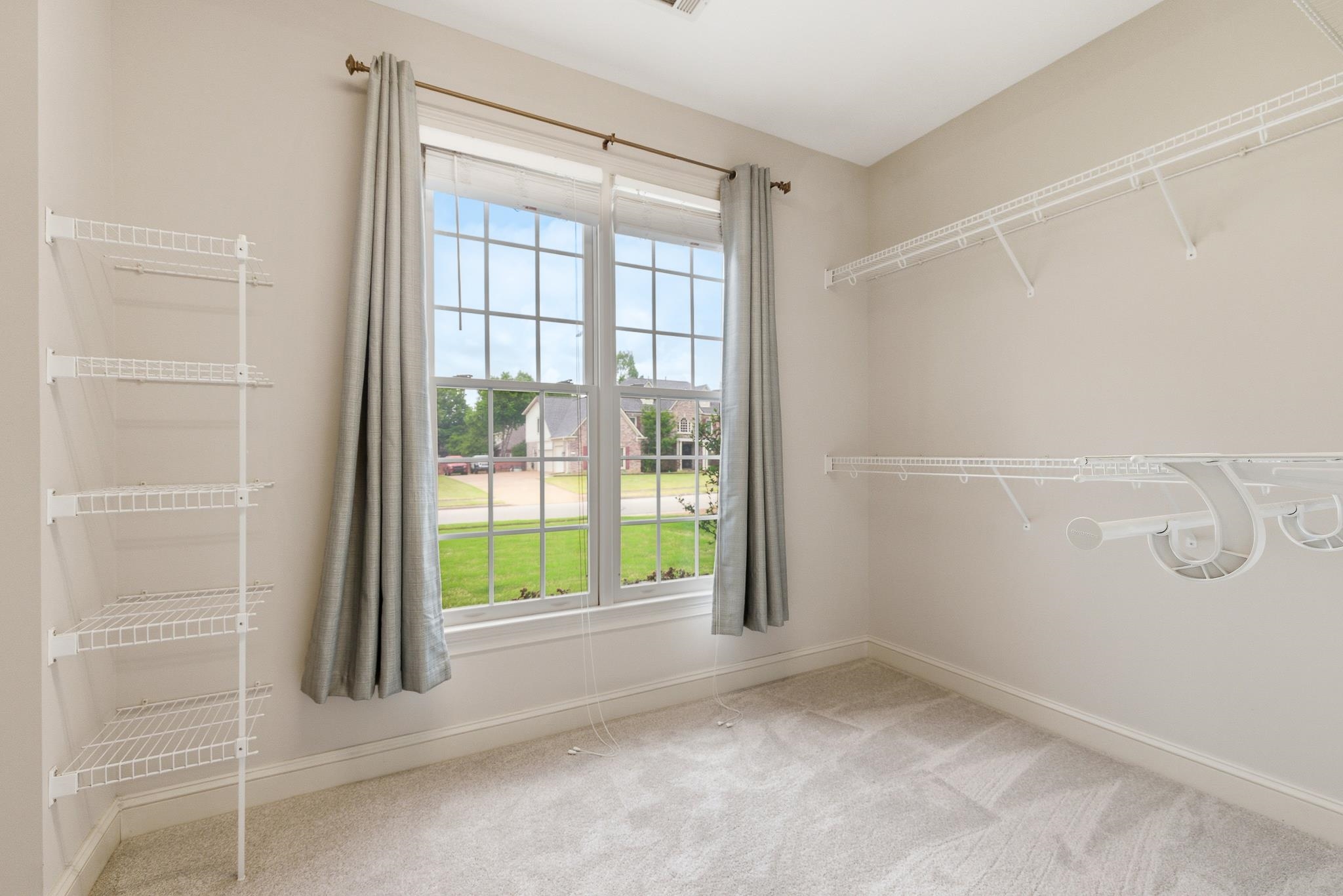 1348 Colbert Cove Collierville, TN 38017 - Photo 20 of 34 a view of an empty room with a window