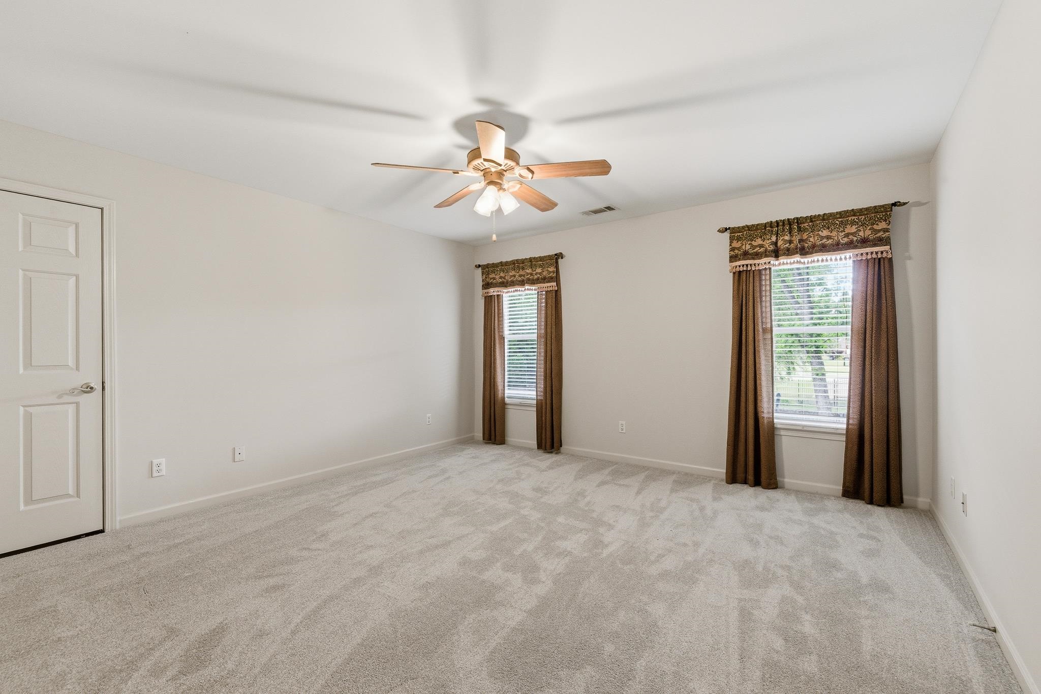1348 Colbert Cove Collierville, TN 38017 - Photo 21 of 34 a view of an empty room with a window