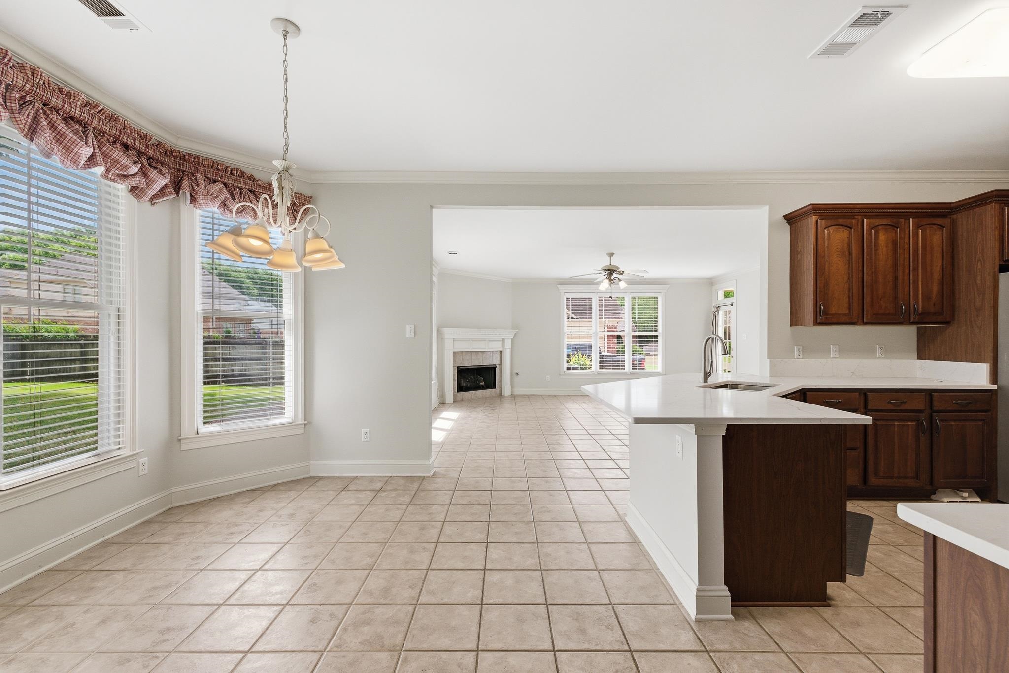1348 Colbert Cove Collierville, TN 38017 - Photo 8 of 34 a view of a kitchen with cabinets and furniture
