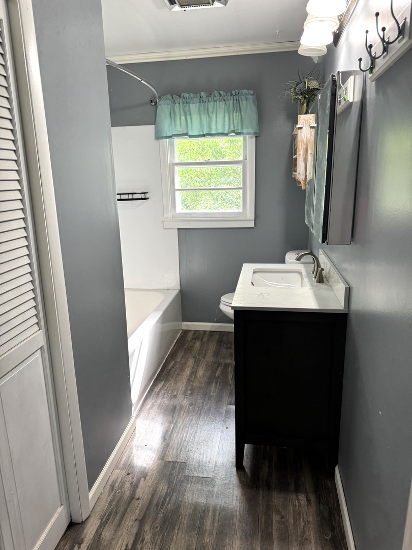 2884 Tick Ridge Road Grand Chain, IL 62941 - Photo 21 of 35 a room with a sink and a mirror
