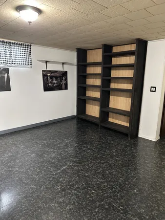 a view of a room with an empty space
