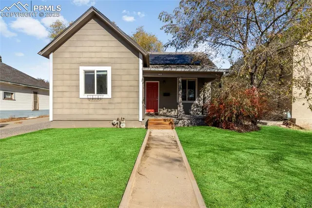 a front view of house with yard