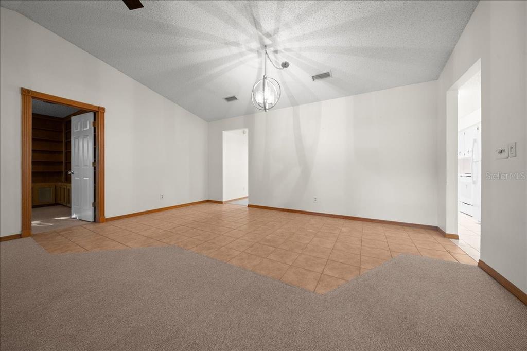 8431 Southwest 93rd Place, Unit A Ocala, FL 34481 - Photo 18 of 56 a view of an empty room with a window