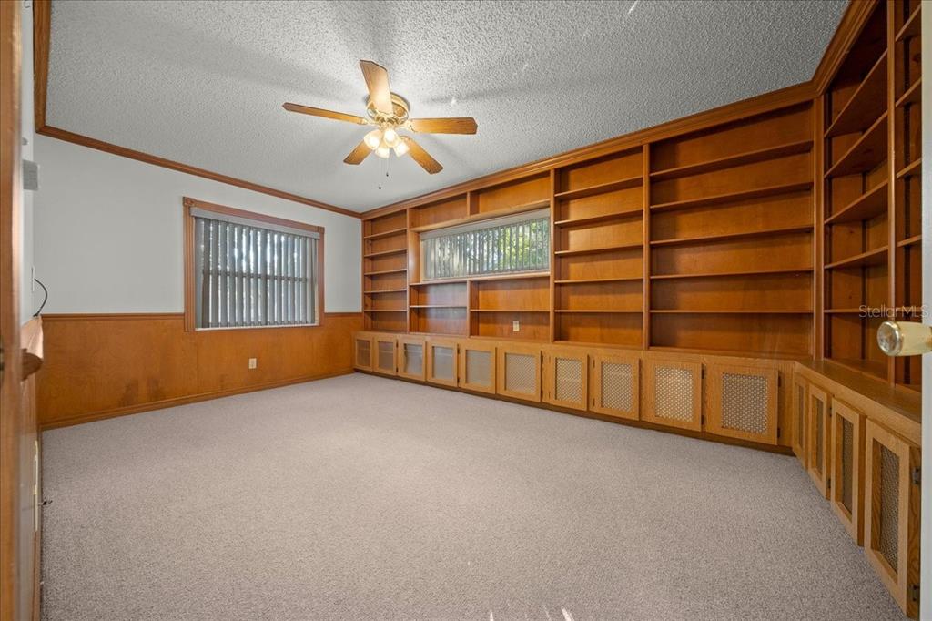 8431 Southwest 93rd Place, Unit A Ocala, FL 34481 - Photo 19 of 56 a view of an empty room with a window