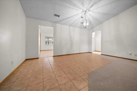 a view of a kitchen with furniture and a fireplace