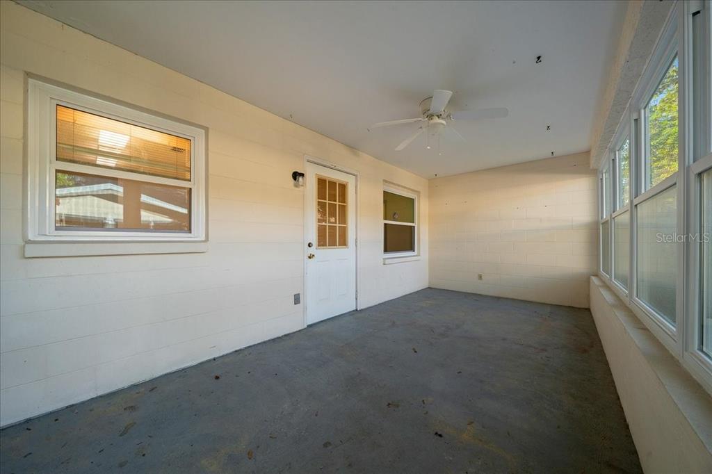 8431 Southwest 93rd Place, Unit A Ocala, FL 34481 - Photo 53 of 56 a view of an empty room with a window
