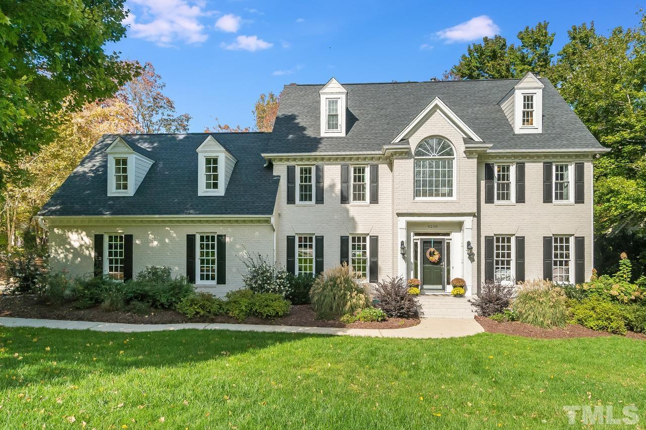 9200 Ranworth Way Raleigh, NC 27615 - Photo 1 of 39 Features a corner lot with a landscape yard.