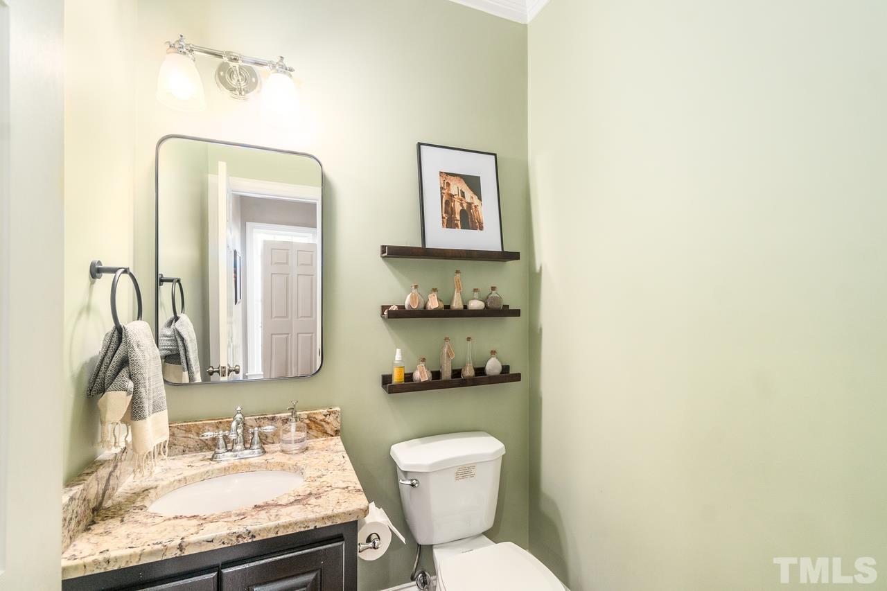 9200 Ranworth Way Raleigh, NC 27615 - Photo 14 of 39 this half bath is conveniently located right off the kitchen on the main floor.