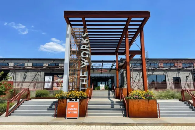a front view of a building with street view