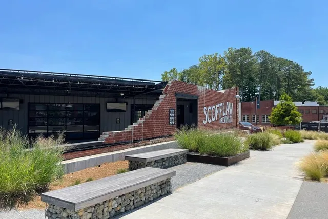a view of house with outdoor space and seating area