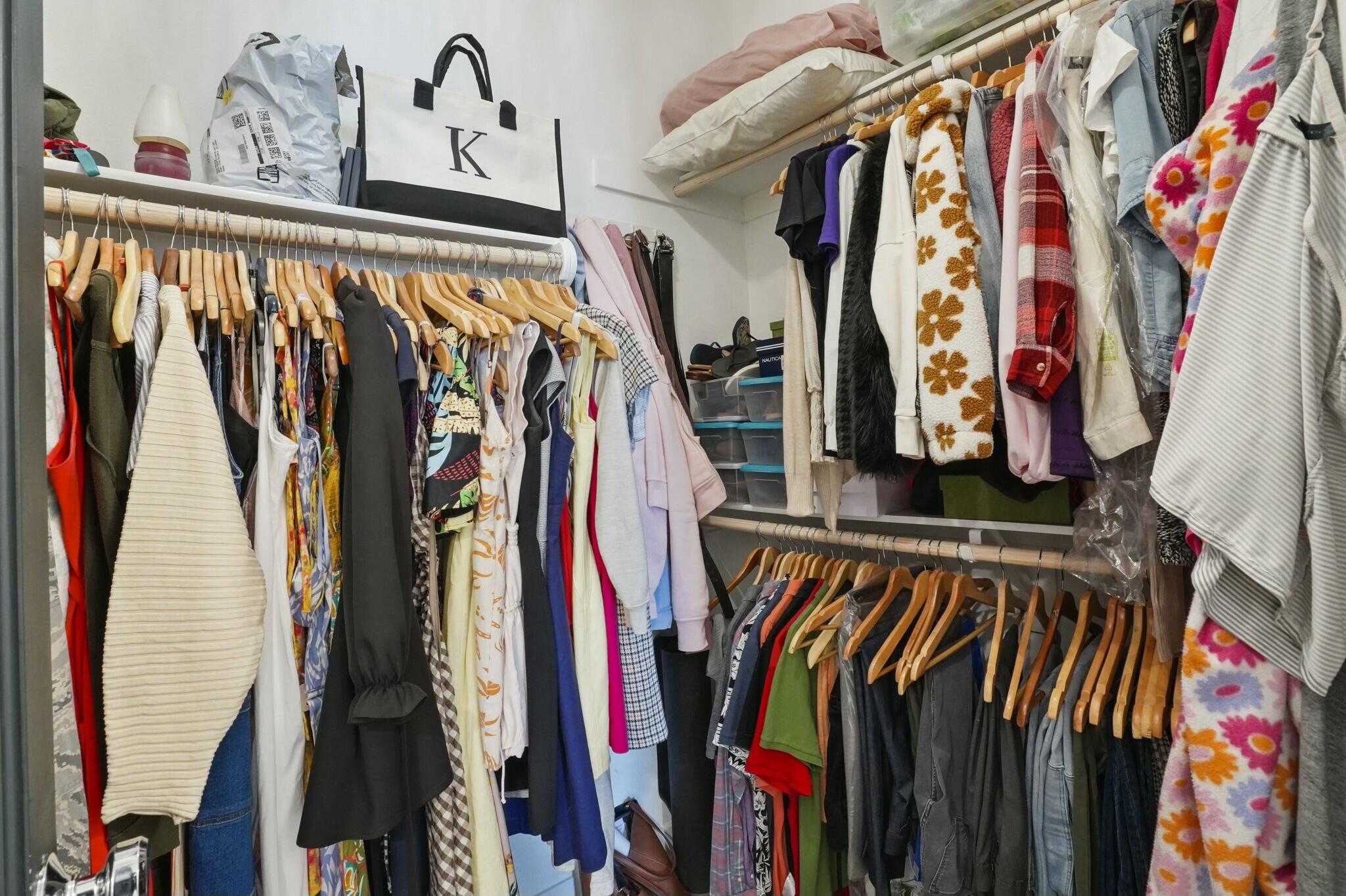 26976 West Prospector Road, Unit 205 Valencia, CA 91381 - Photo 17 of 31 a view of walk in closet with clothes and shoes