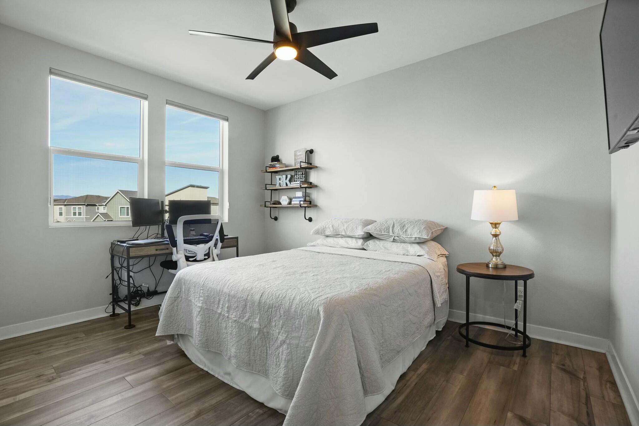 26976 West Prospector Road, Unit 205 Valencia, CA 91381 - Photo 20 of 31 a bedroom with a bed and a table