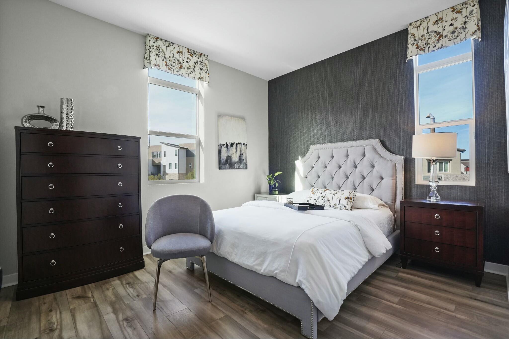 26976 West Prospector Road, Unit 205 Valencia, CA 91381 - Photo 23 of 31 a bedroom with a bed and a closet