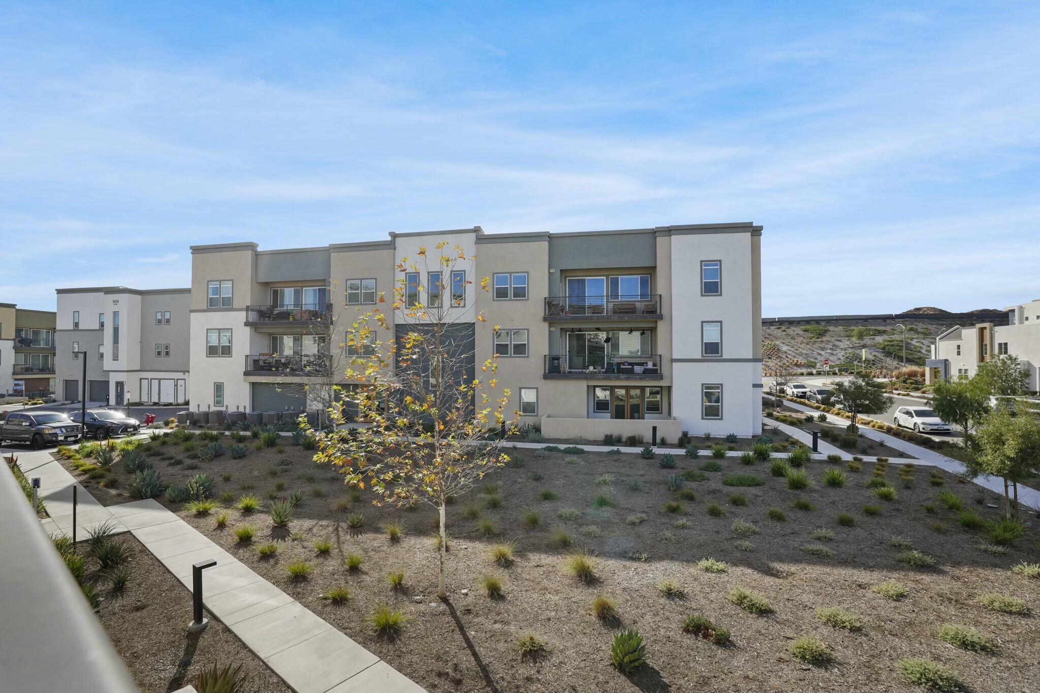 26976 West Prospector Road, Unit 205 Valencia, CA 91381 - Photo 27 of 31 a view of a city with tall buildings