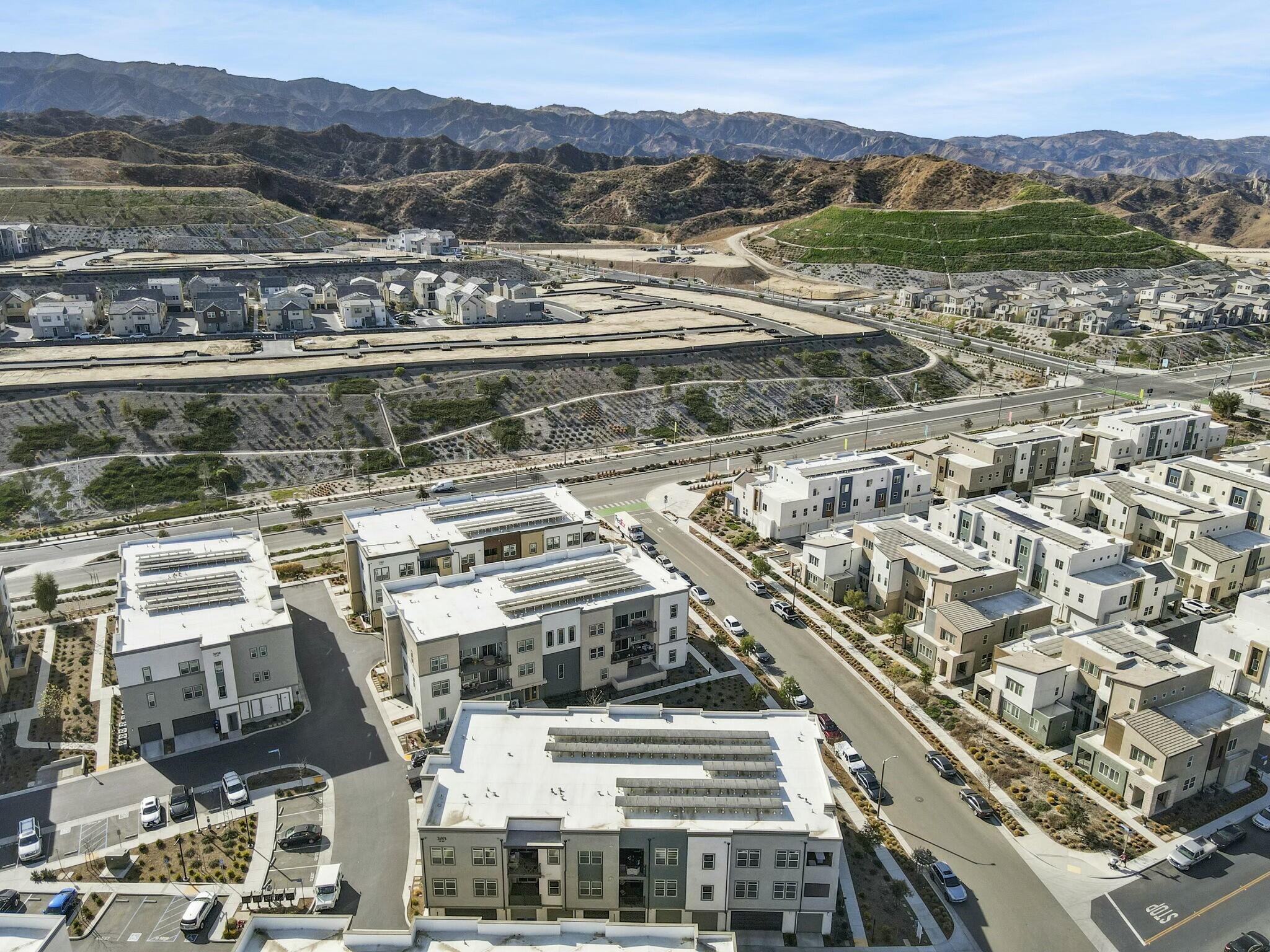 26976 West Prospector Road, Unit 205 Valencia, CA 91381 - Photo 5 of 31 a view of a city with a mountain