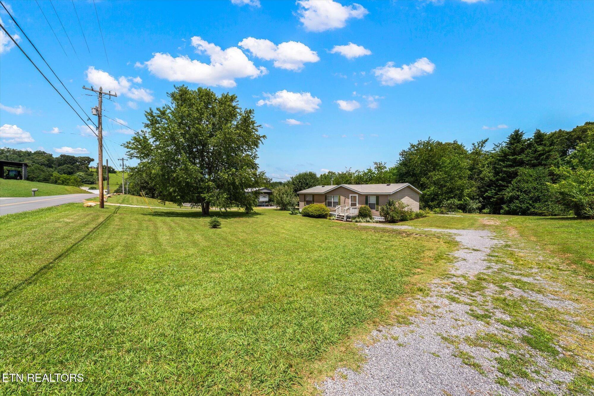 2764 Roberts Road Kodak, TN 37764 - Photo 3 of 29 Front yard and driveway